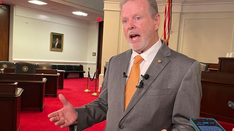 Republican North Carolina Senate leader Phil Berger speaks to reporters...