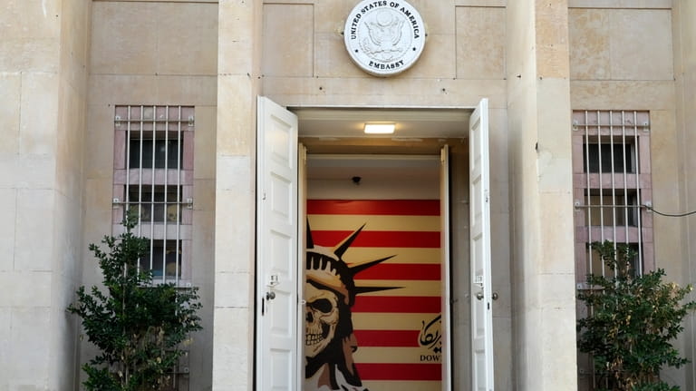 The entrance to the former U.S. Embassy, which has been...