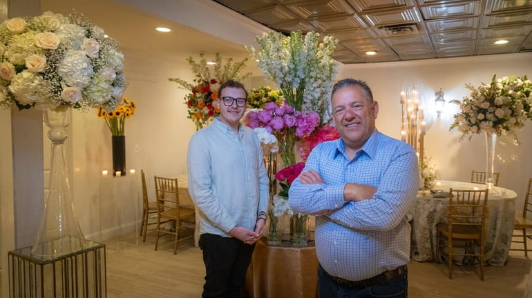 Brian Cohen, right, and son Andrew import flowers from around...