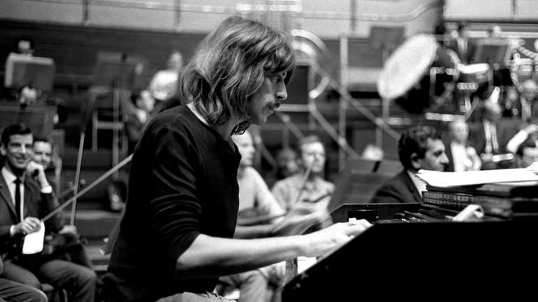 Deep Purple's keyboard player, Jon Lord, is seen above. (Sept....