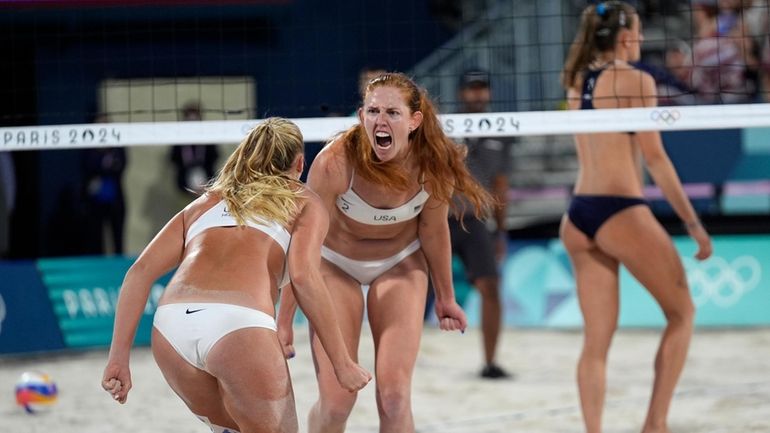 United States' Kelly Cheng, center, and Sara Hughes celebrate their...