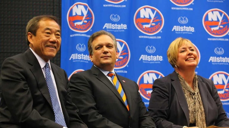 New York Islanders owner Charles Wang with Nassau County Executive...