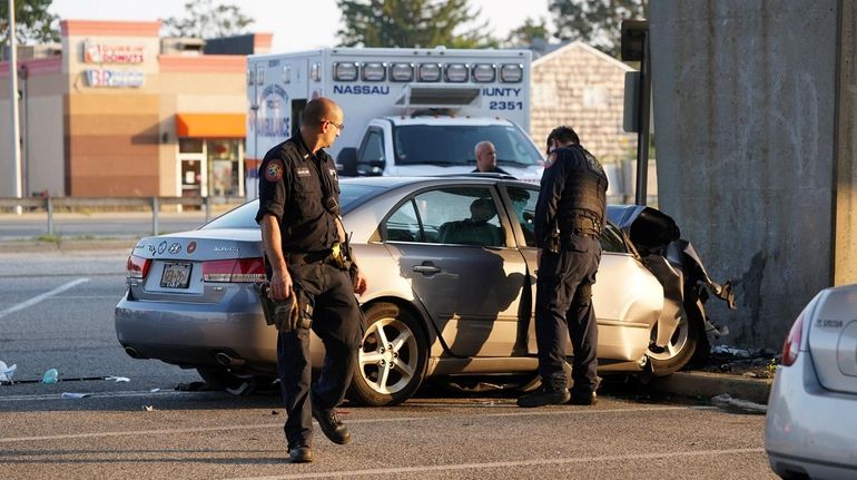 Nassau County police investigate after a driver crashed into a...