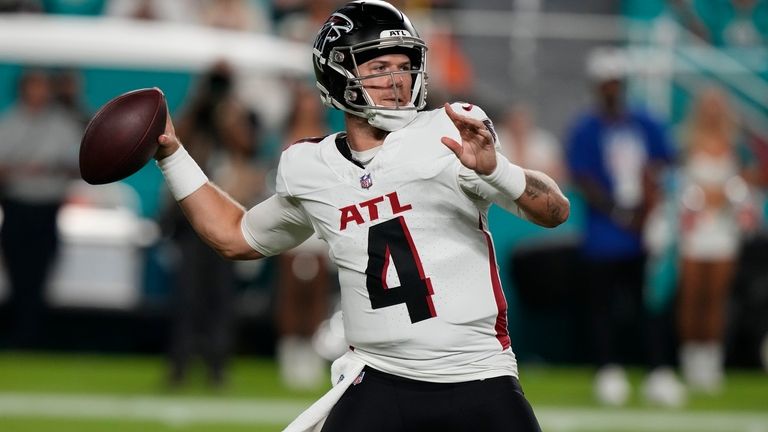 Atlanta Falcons quarterback Taylor Heinicke (4) aims a pass during...