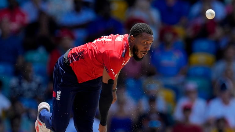 England's Chris Jordan bowls the delivery to get a hat-trick...