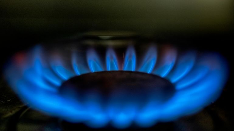 A gas-lit flame burns on a natural gas stove, March...