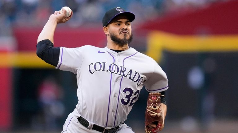 Colorado Rockies staring pitcher Dinelson Lamet throws to an Arizona...