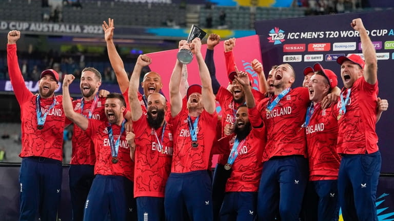 England celebrate with their trophy after defeating Pakistan in the...