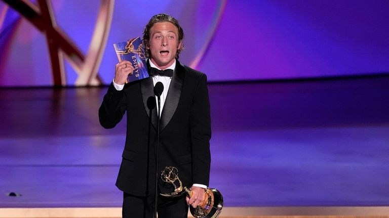 Jeremy Allen White accepts the award for outstanding lead actor...