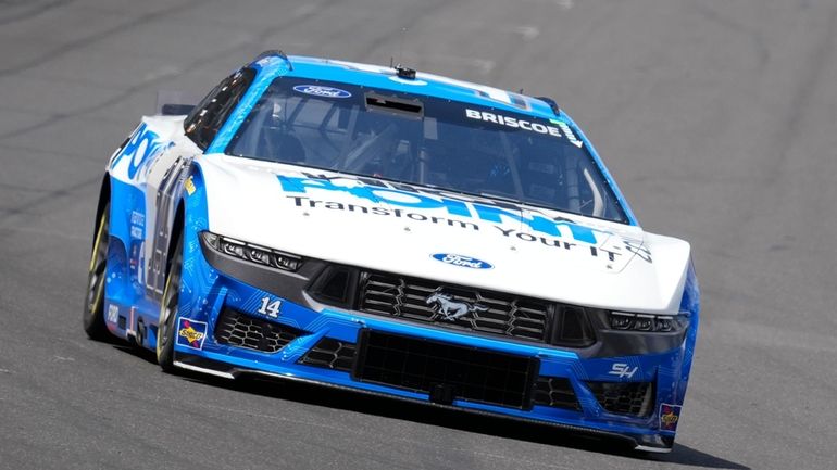 Chase Briscoe drives into a turn during a practice session...