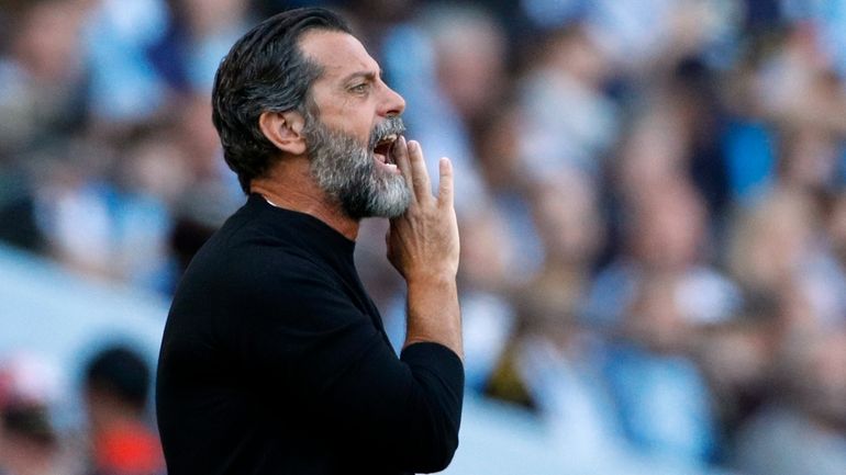 The then Watford's head coach Quique Sanchez Flores shouts during...