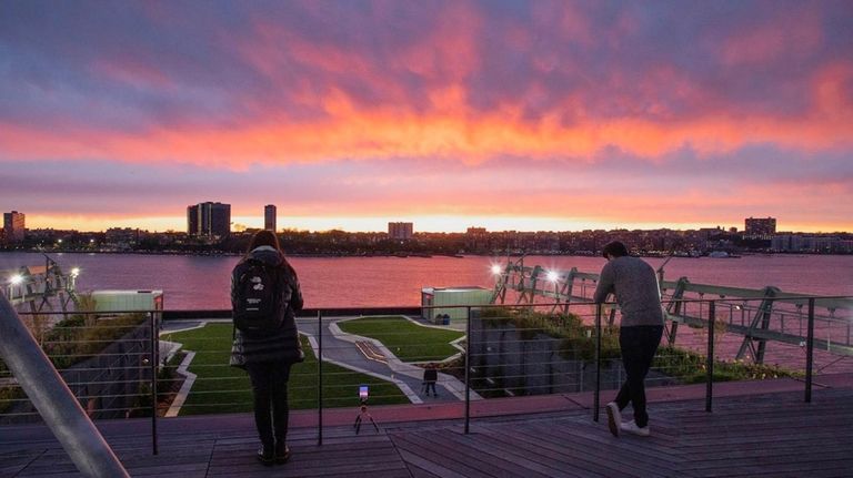 Catch the sunset at Pier 57 rooftop.