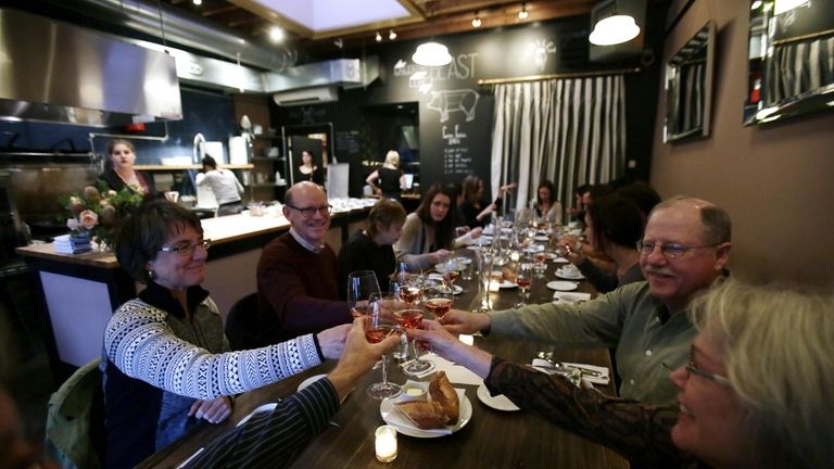 Patrons toasting at Naomi Pomeroy's Beast restaurant on Sept. 27,...