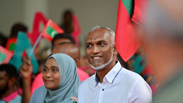 Maldives' main opposition candidate Mohamed Muiz participates in a rally...