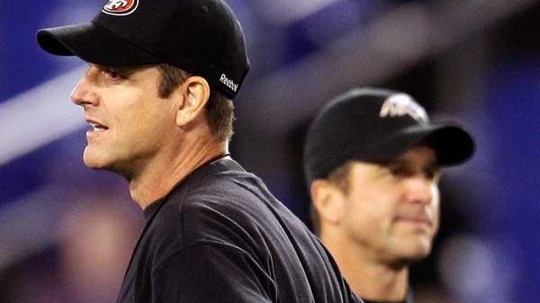 Jim Harbaugh, left, and his brother John (Getty Images)