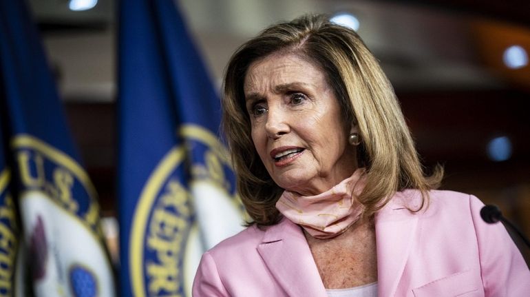 House Speaker Nancy Pelosi speaks during a news conference at...