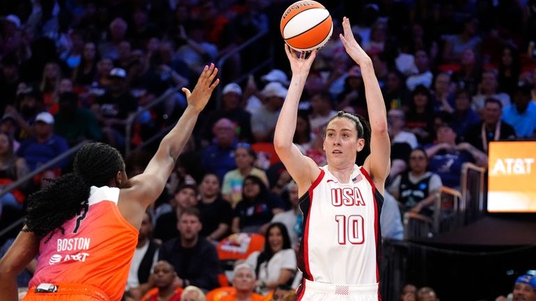 Breanna Stewart (10), of Team USA, looks to shoot a...