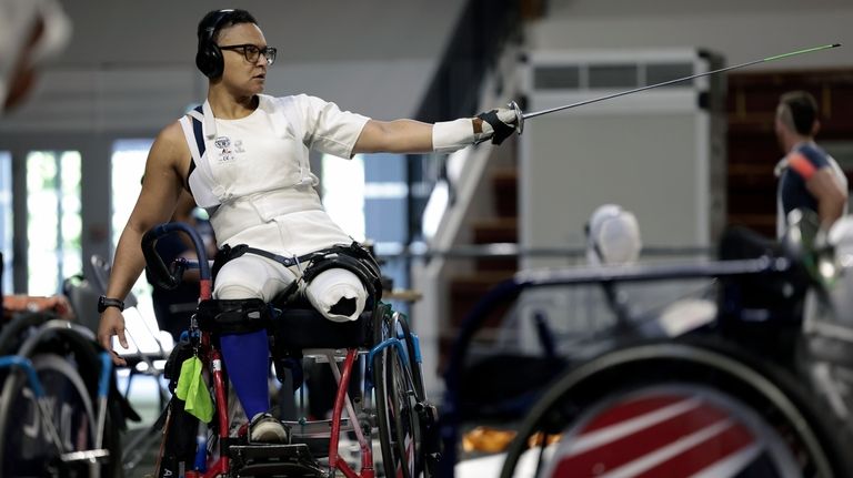 Wheelchair fencer Jataya Taylor from the U.S. practices during a...