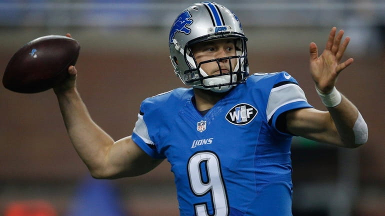 Matthew Stafford of the Detroit Lions throws a pass against...