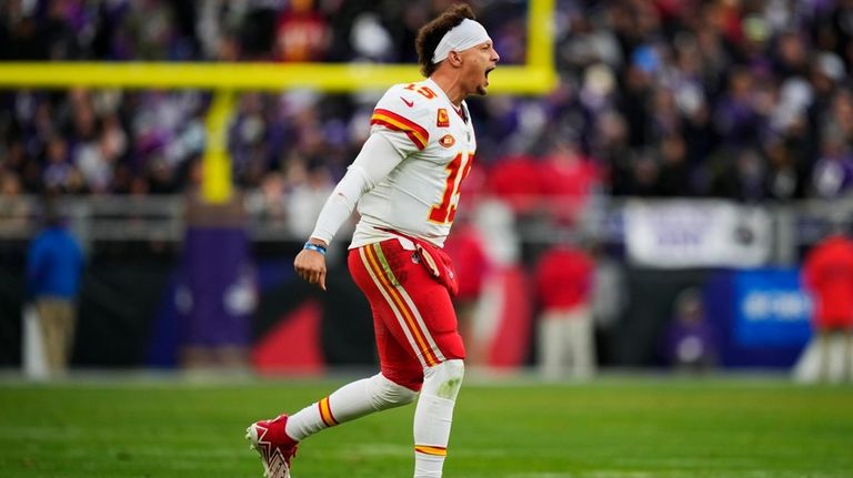 Kansas City Chiefs quarterback Patrick Mahomes (15) reacts after a...