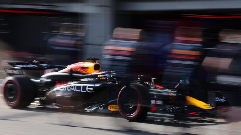 Red Bull driver Max Verstappen of the Netherlands enters the...