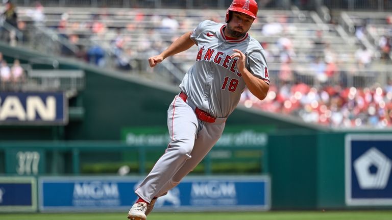 Los Angeles Angels' Nolan Schanuel heads home for a score...