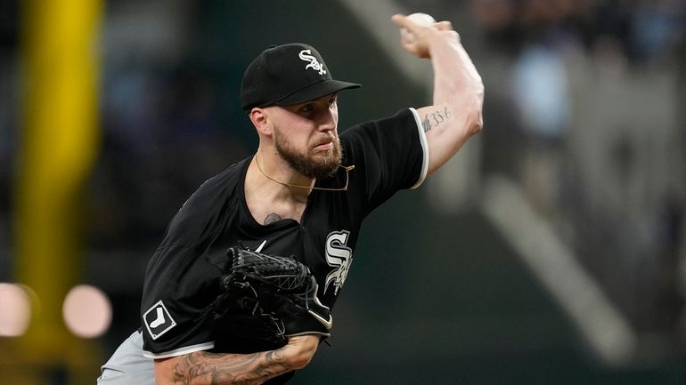 Chicago White Sox starting pitcher Garrett Crochet throws to the...