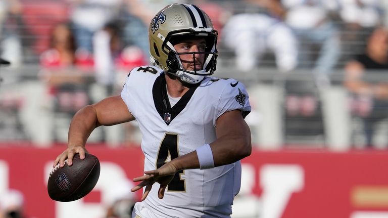 New Orleans Saints quarterback Derek Carr (4) passes against the...