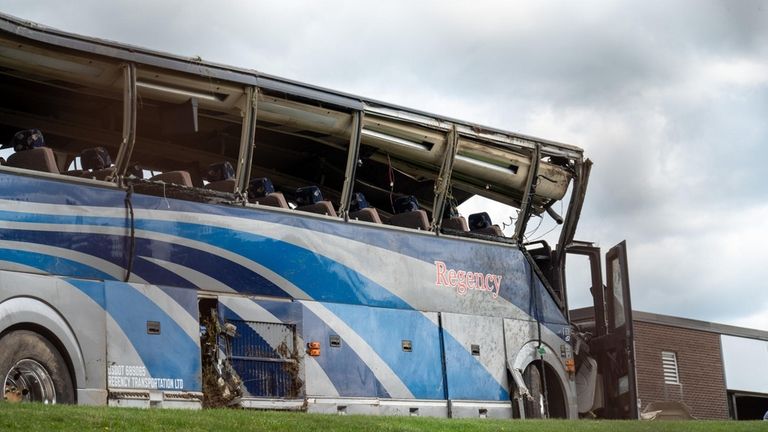 The bus outside State Police Troop F headquarters on Friday.