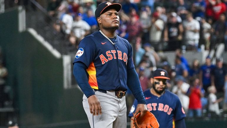 Houston Astros Framber Valdez stands on the mound before he...