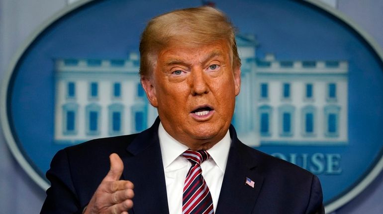 President Donald Trump speaks at the White House on Nov. 5. Journalists...