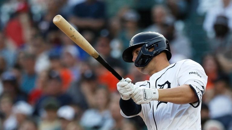 Detroit Tigers' Spencer Torkelson hits an RBI-single to drive in...