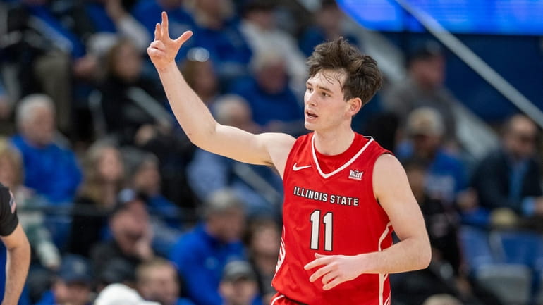 Illinois State guard Johnny Kinziger (11) gestures after scoring a...
