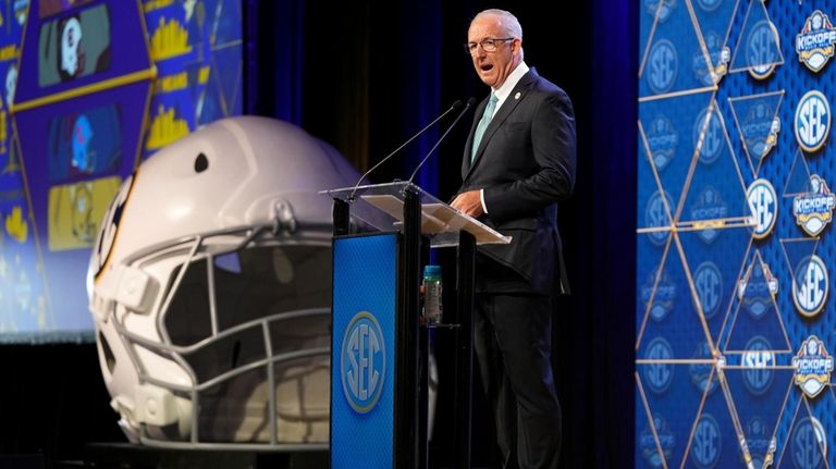 Southeastern Conference commissioner George Sankey gives an opening address during...