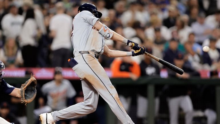 Detroit Tigers' Parker Meadows hits a solo home run on...