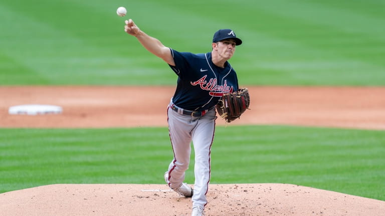 Atlanta Braves starting pitcher Allan Winans delivers during the first...
