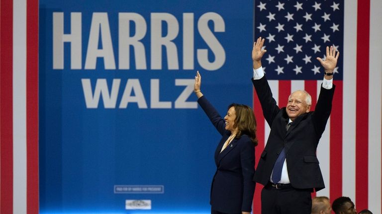 Democratic presidential nominee Vice President Kamala Harris and her running...