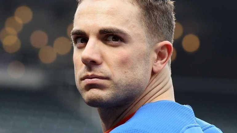 David Wright (5) of the New York Mets looks on...