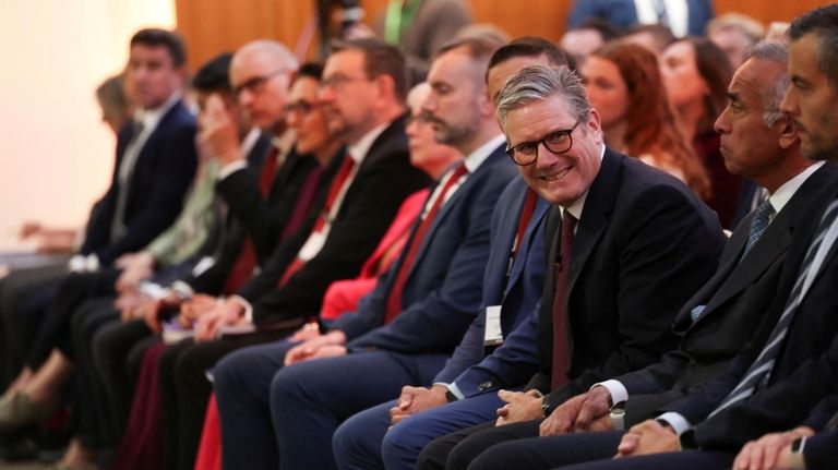 Britain's Prime Minister Keir Starmer reacts on the day he...