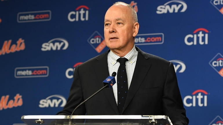 Mets general manager Sandy Alderson speaks at a news conference to...