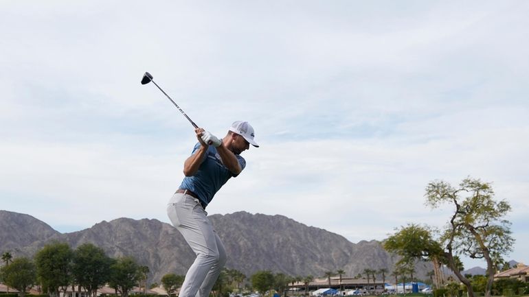 Sam Burns hits from the 18th tee at the Nicklaus...