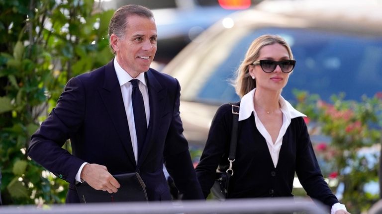 Hunter Biden arrives to federal court with his wife, Melissa...