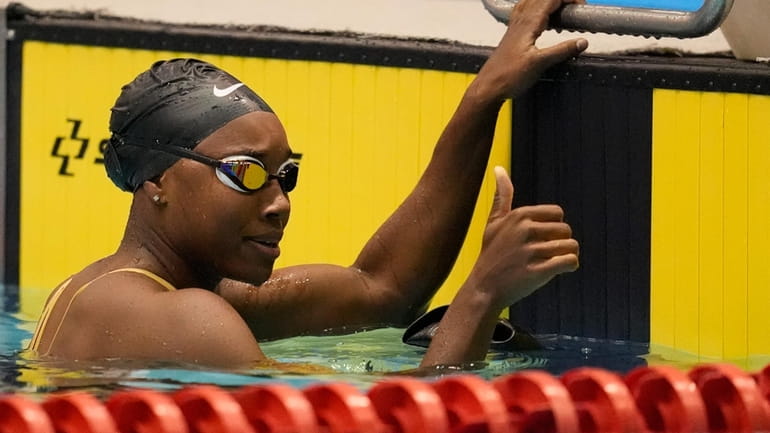 Simone Manuel gives a thumbs up after competing at the...