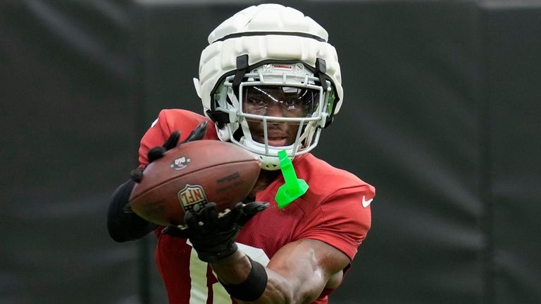 Arizona Cardinals wide receiver Marvin Harrison Jr. makes a catch...