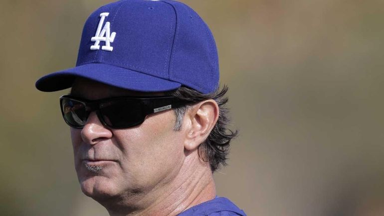 Los Angeles Dodgers manager Don Mattingly watches during a baseball...