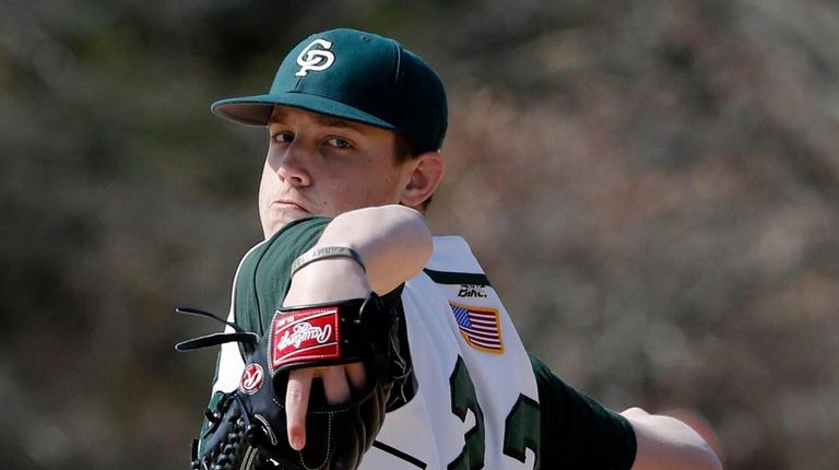 Carle Place pitcher Mike Delio on Saturday, April 5, 2014.