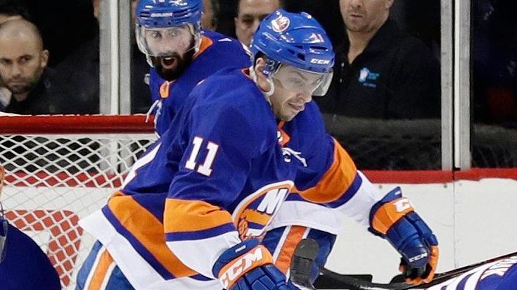 The Islanders' Shane Prince, Johnny Boychuk and Ducks' Andrew Cogliano...