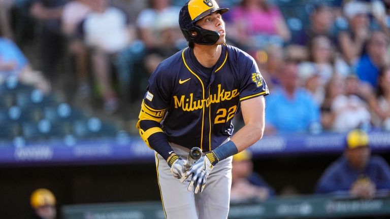 Milwaukee Brewers' Christian Yelich heads up the first base line...