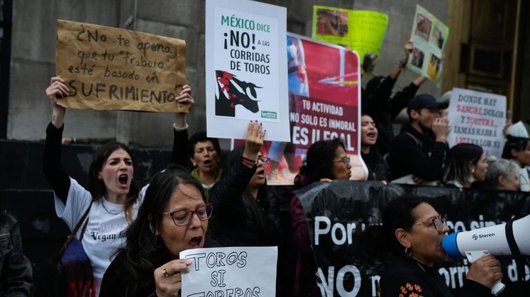 Animal rights activists bullfighting gather outside the Supreme Court building...