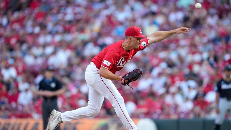 Cincinnati Reds pitcher Brent Suter throws during the ninth inning...